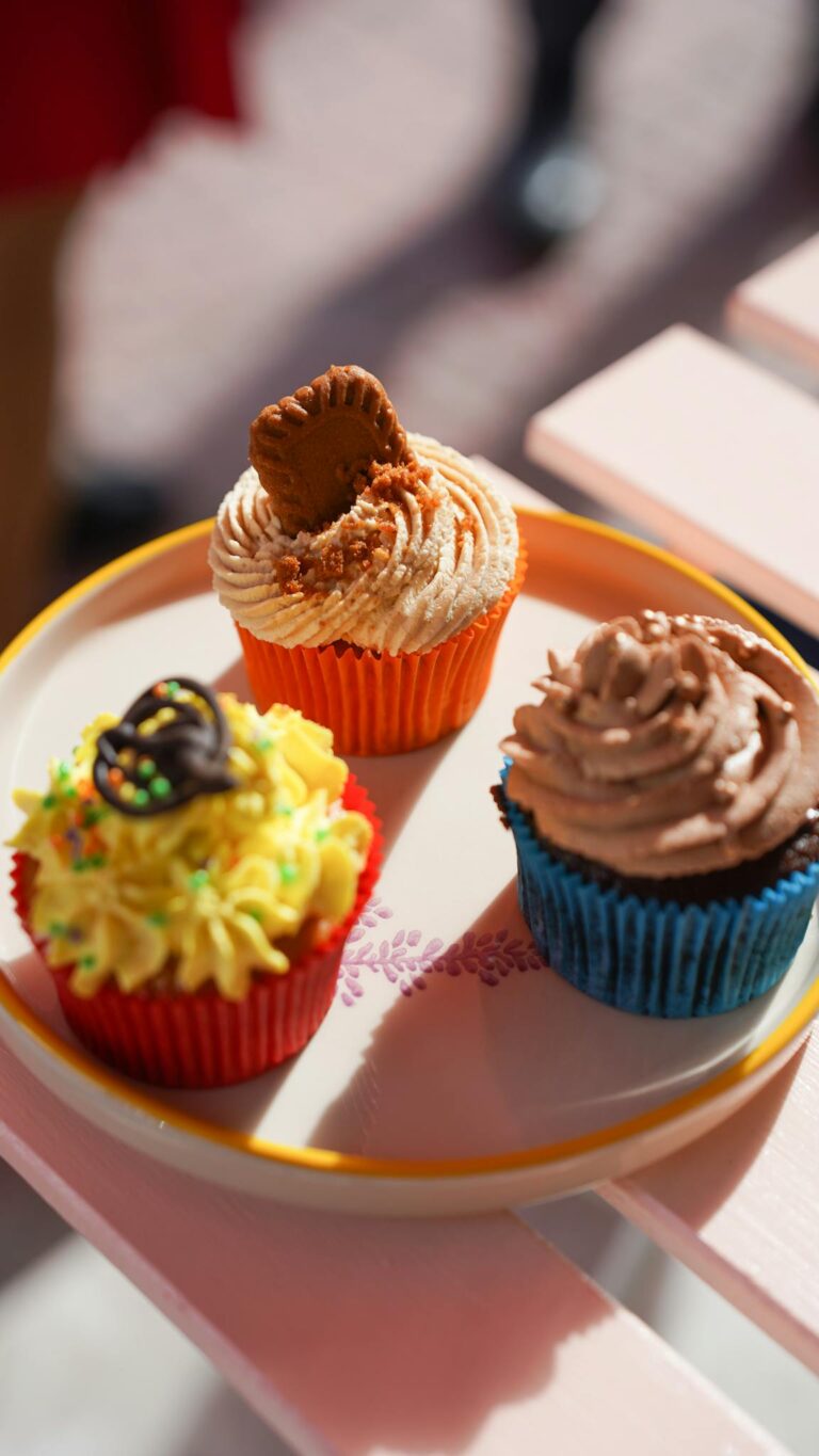 Vibrant cupcakes with decorative icing, perfect for dessert or snack time.